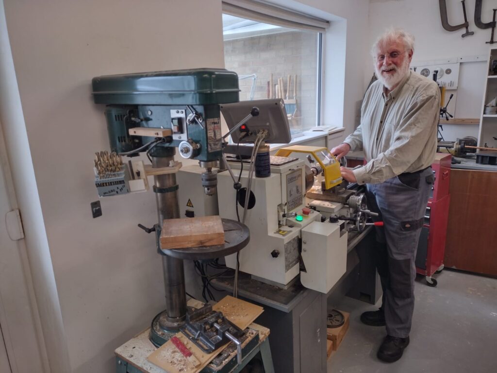 Andrew using the Chester Lathe